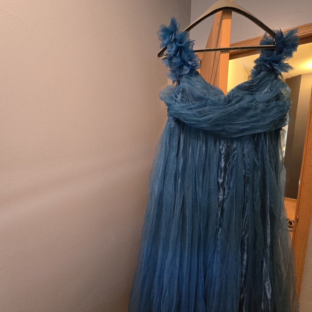 Elegant Blue Formal Dress with Floral Details